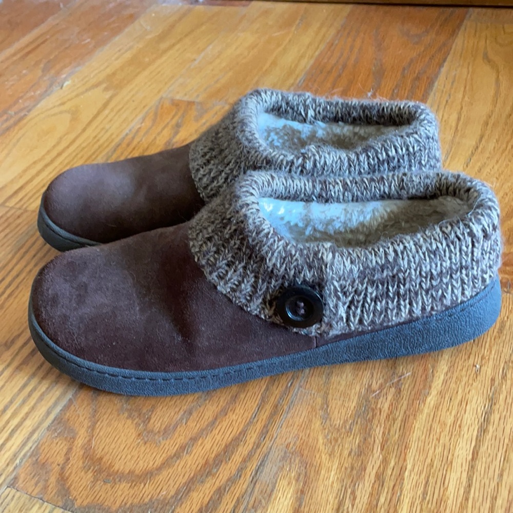 Brown Clark’s slippers.